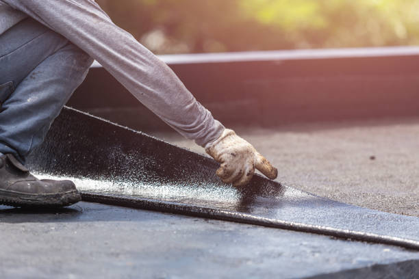 Professional Exterior Waterproofing technician working in Madison, AL
